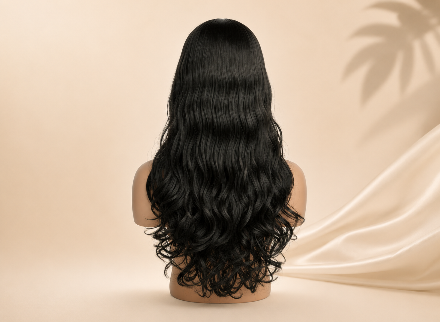 Clip-in hair extensions in natural black with long wavy length, shown from the back